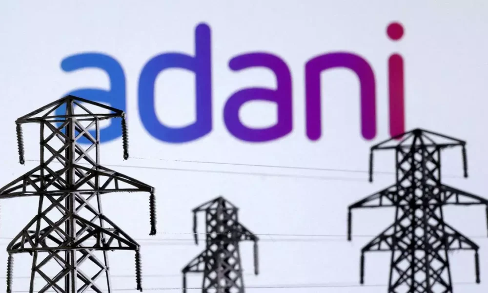 Adani Energy Solutions enters Kenya’s energy market in a deal with KETRACO, aiming to improve power infrastructure while facing scrutiny over its global record.