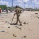 A suicide bombing at Somalia's Damaanyo base killed 21, intensifying global concern over al-Shabaab’s resurgence and military base infiltration.